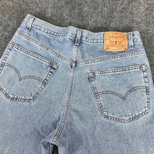 VTG '99 Levi's 550 Relaxed Fit Light Wash Denim Jeans Men's 35x30 (TAG 38x30)